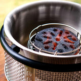 Single CobbleStone burning inside COBB grill