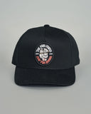 Black twill snapback cap with embroidered Ship For Brains graphic, structured crown, flat brim, and adjustable snapback closure for a classic fit