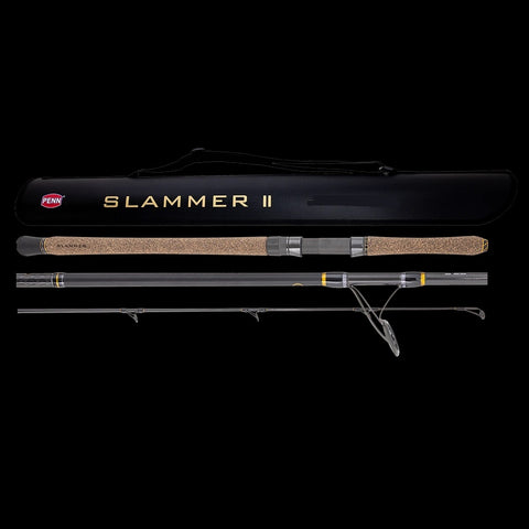 PENN Slammer II Travel Spin 823XXH rod with Fuji guides and EVA/cork grips, designed for heavy offshore fishing.