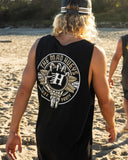 Mad Hueys Surf Hueys Tank in Black – men’s sleeveless surf tank with bold FK Off H emblem, surfboards, and skeleton hand design.