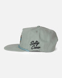 Salty Crew Coastal Snapback Cap in Iceberg with embroidered front artwork and a light-coloured five-panel cotton canvas design.