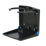 Black folding drink holder mounted on flat surface

White UV stabilised folding drink holder open ready for use

Compact folding drink holder folded down to 24mm