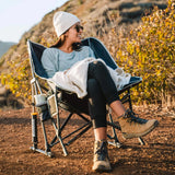 GCI Outdoor Pod Rocker camping chair with breathable mesh panels, bucket-style seat, rocking frame and carry strap.