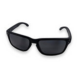 Saltatrix Shadow Series polarized sunglasses with black recycled plastic frames and grey polycarbonate lens.
