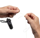 Shimano Torque Knotter black fishing knot-tying tool with line clamp and metal hook for tightening fishing knots and securing leaders.