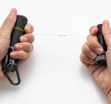 Shimano Torque Knotter black fishing knot-tying tool with line clamp and metal hook for tightening fishing knots and securing leaders.
